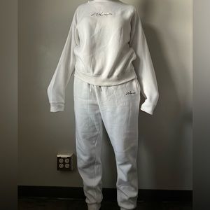 Women cream tracksuit size L